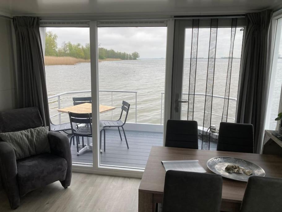 Houseboot Kingfisher, Lake View Biddinghuizen Esterno foto